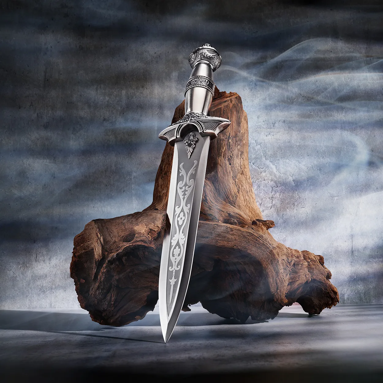 a_picture_of_a_sword_resting_on_wood